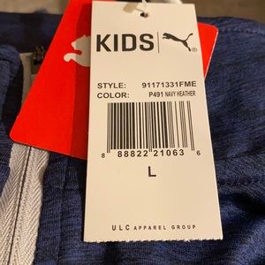 Puma sz L-boy(14-16) Brand new , with tags, from smoke free home.Color-Dark blue